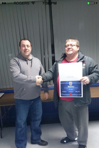 Teamster Dave Wyatt receiving Warehouse Diploma